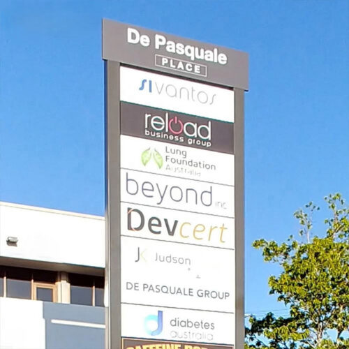 Illuminated Digital Pylon Sign for Automotive Dealership Entrances Illuminated Digital Pylon Sign for Automotive Dealership Entrances